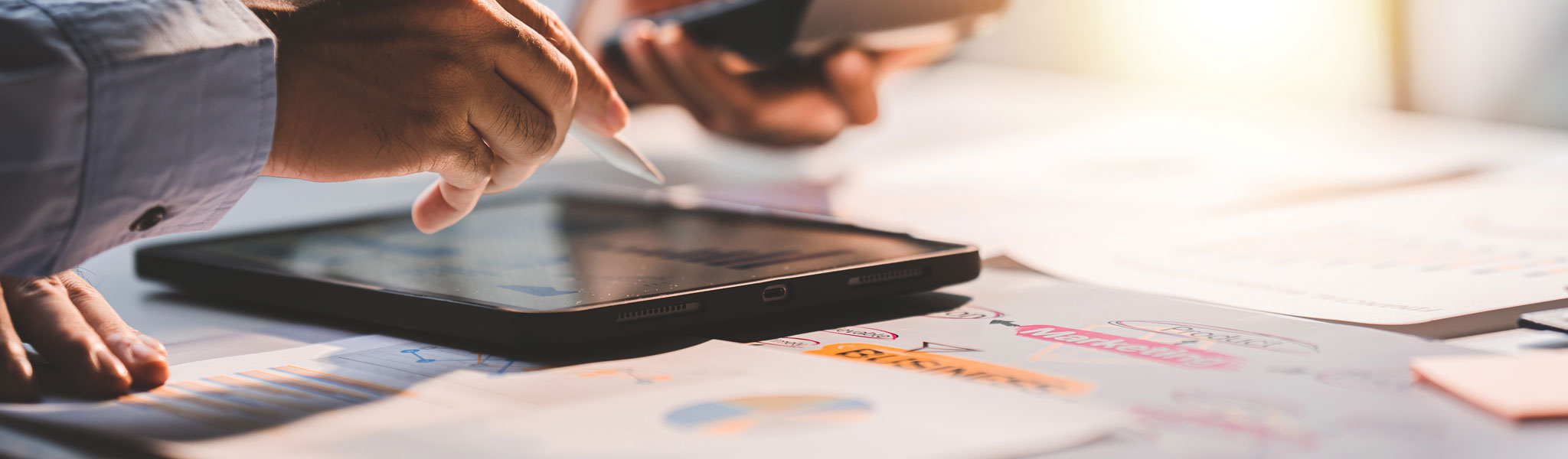 Young Colleagues Discuss Business And Analytical Price Charts Us